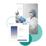 A person in a cleansuit working in a lab
