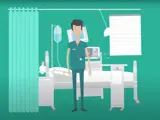 A cartoon of a man in scrubs standing in front of a hospital bed