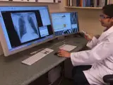 doctor views an xray